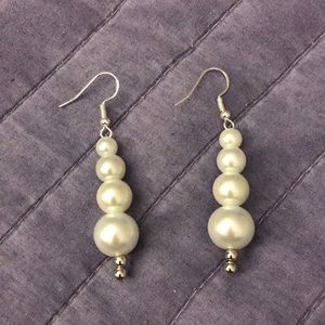 Pearl teardrop earrings. Sterling silver hooks and beads